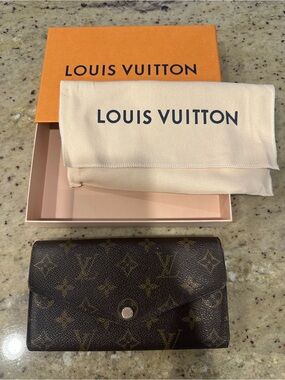 Louis Vuitton Monogram Flap Wallet in Brown